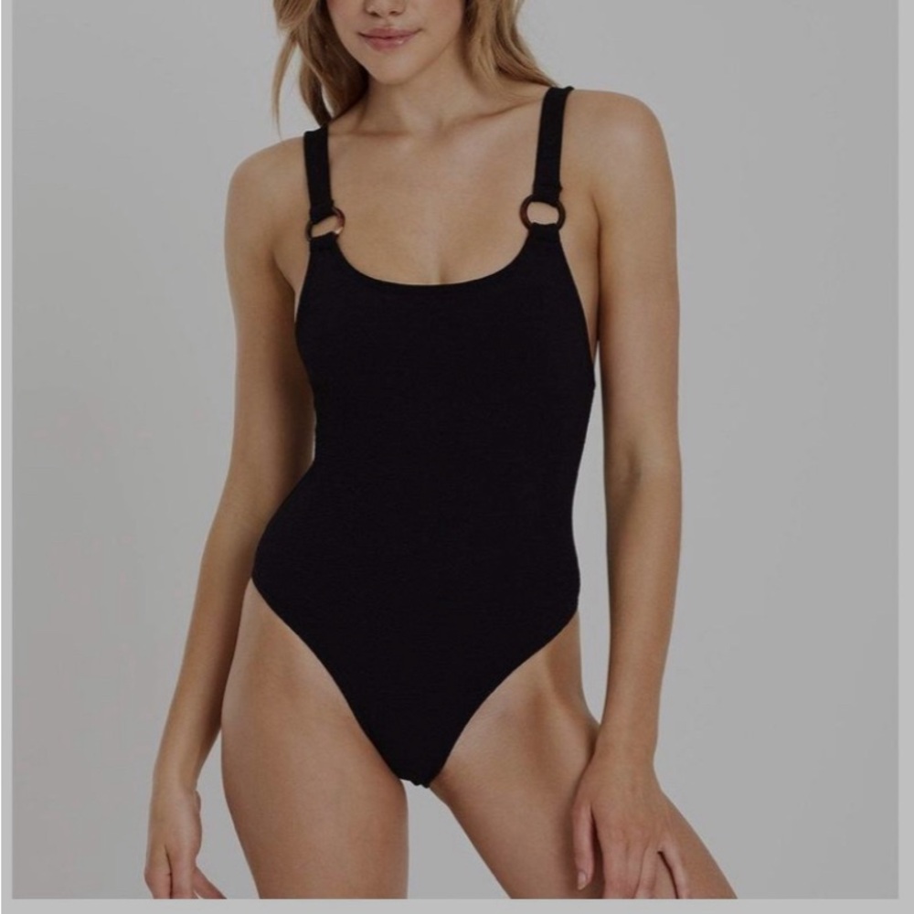 Charlie Holiday black one piece swimsuit.